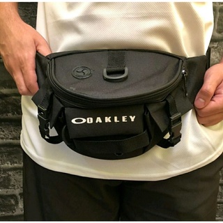 Pochete Oakley bag mini bolsa unissex transversal de ombro ou cintura tamanho ajustável