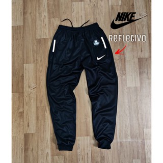 Calça Nike Masculina Modelo Jogger Dri Fit Esporte Com Bolsos e Símbolo Refletivo Lançamento (4)