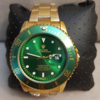 Relogio Rolex Submariner dourado fundo verde luxo masculino .