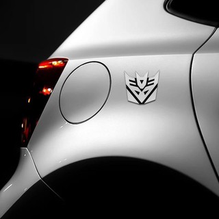 Emblema Transformers Autobot/Decepticons Adesivo Tunning Carro Pvc/ Liga de Aluminio/Cromado- Unitario (2)