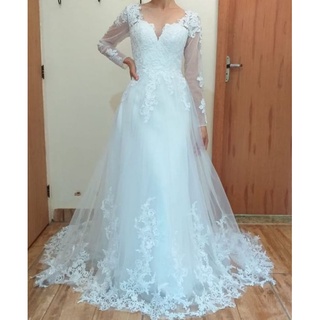 Vestido de noiva bordado em renda