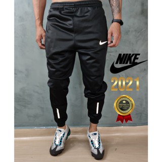 Calça Nike Masculina Jogger Esportiva Dri Fit Com Bolso e Refletivo Pequeno Lançamento
