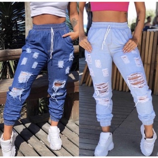 Calça jeans Jogger rasgada blogueira